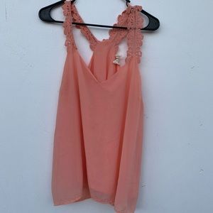 Razor back tank top blouse